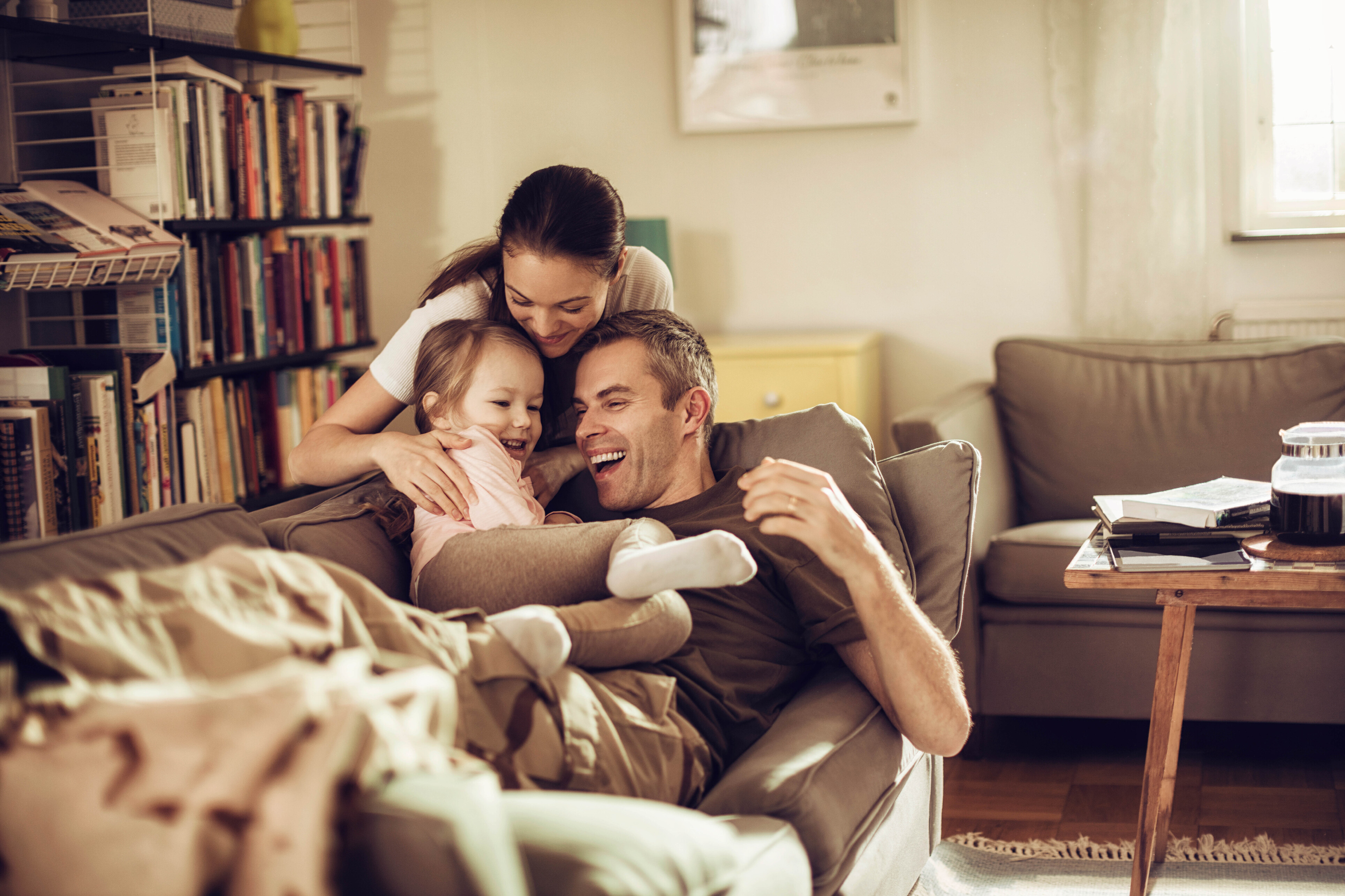 Young family on sofa
